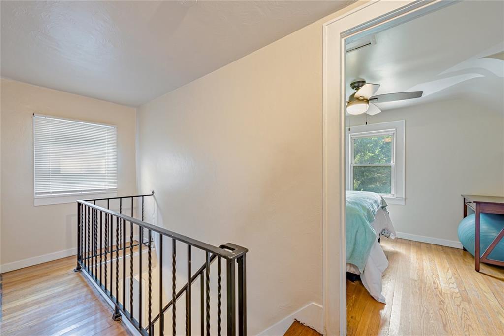 843 Brush Creek Road Penn, PA 15675 - Photo 15 of 22 a view of a hallway to a livingroom with furniture