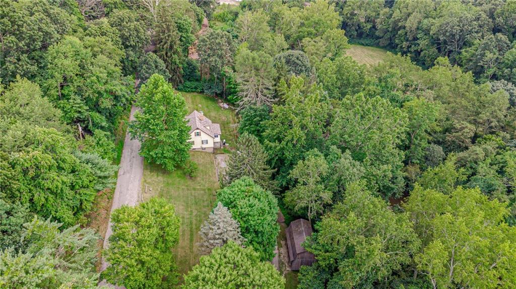 843 Brush Creek Road Penn, PA 15675 - Photo 16 of 22 an aerial view of residential house with outdoor space and trees all around