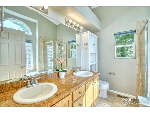 a bathroom with a tub and shower