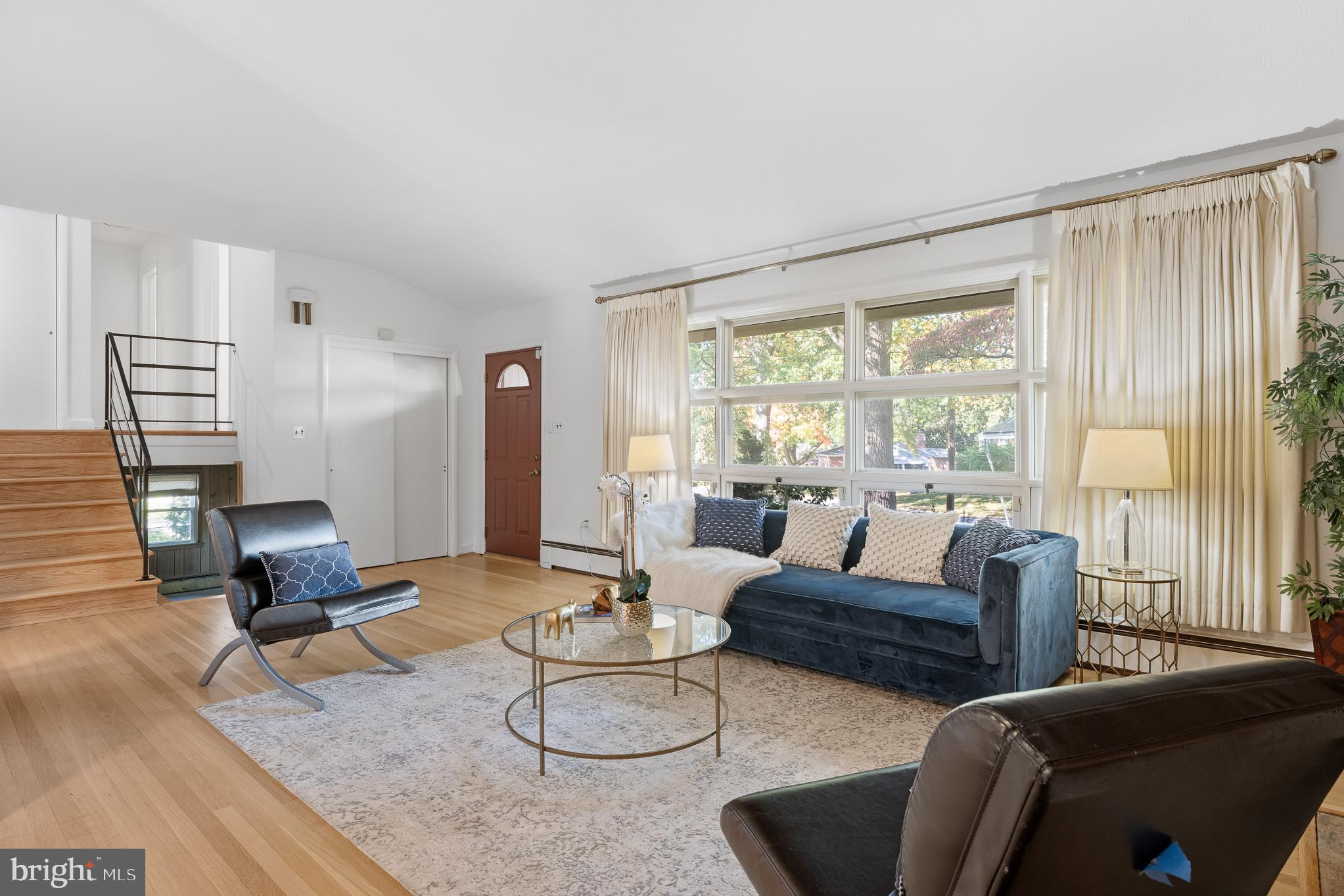 1006 Strout Street Silver Spring, MD 20901 - Photo 11 of 54 a living room with furniture and a window