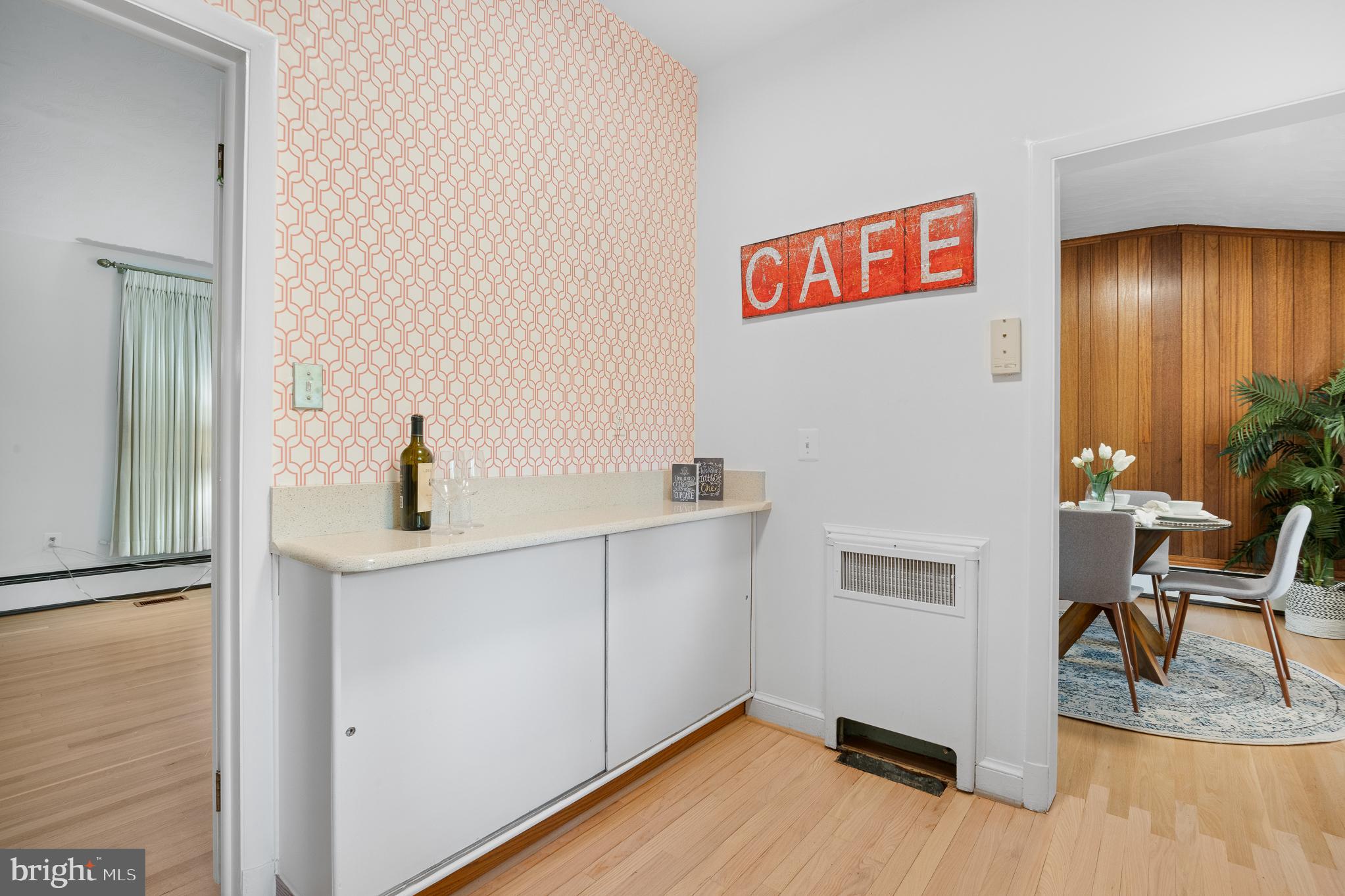 1006 Strout Street Silver Spring, MD 20901 - Photo 19 of 54 a view of kitchen with furniture and wooden floor