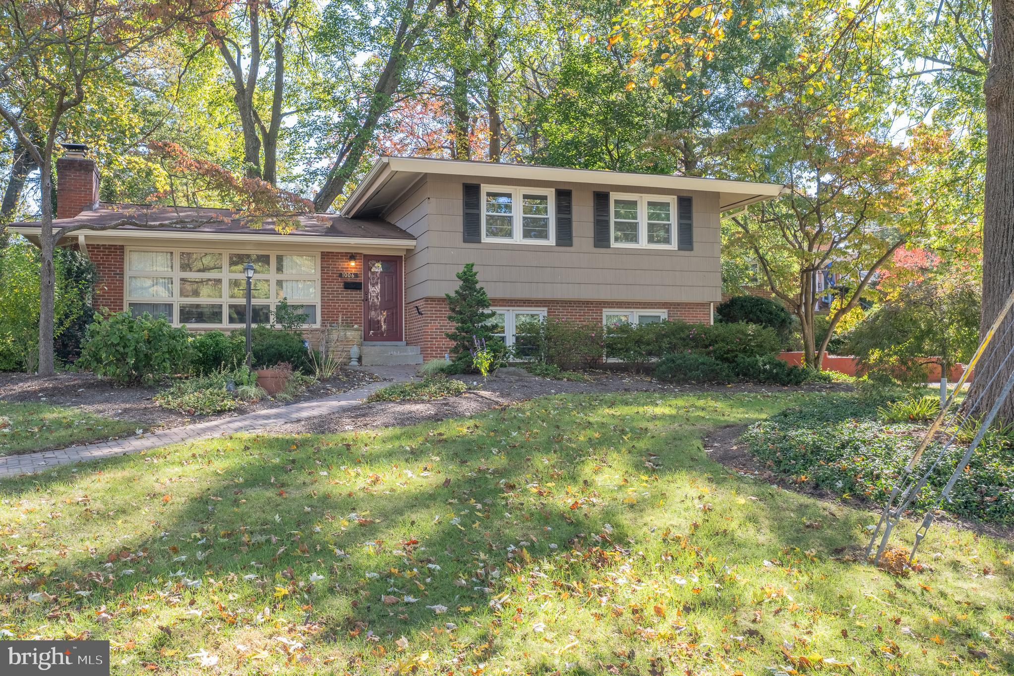 1006 Strout Street Silver Spring, MD 20901 - Photo 2 of 54 a view of a house with a yard