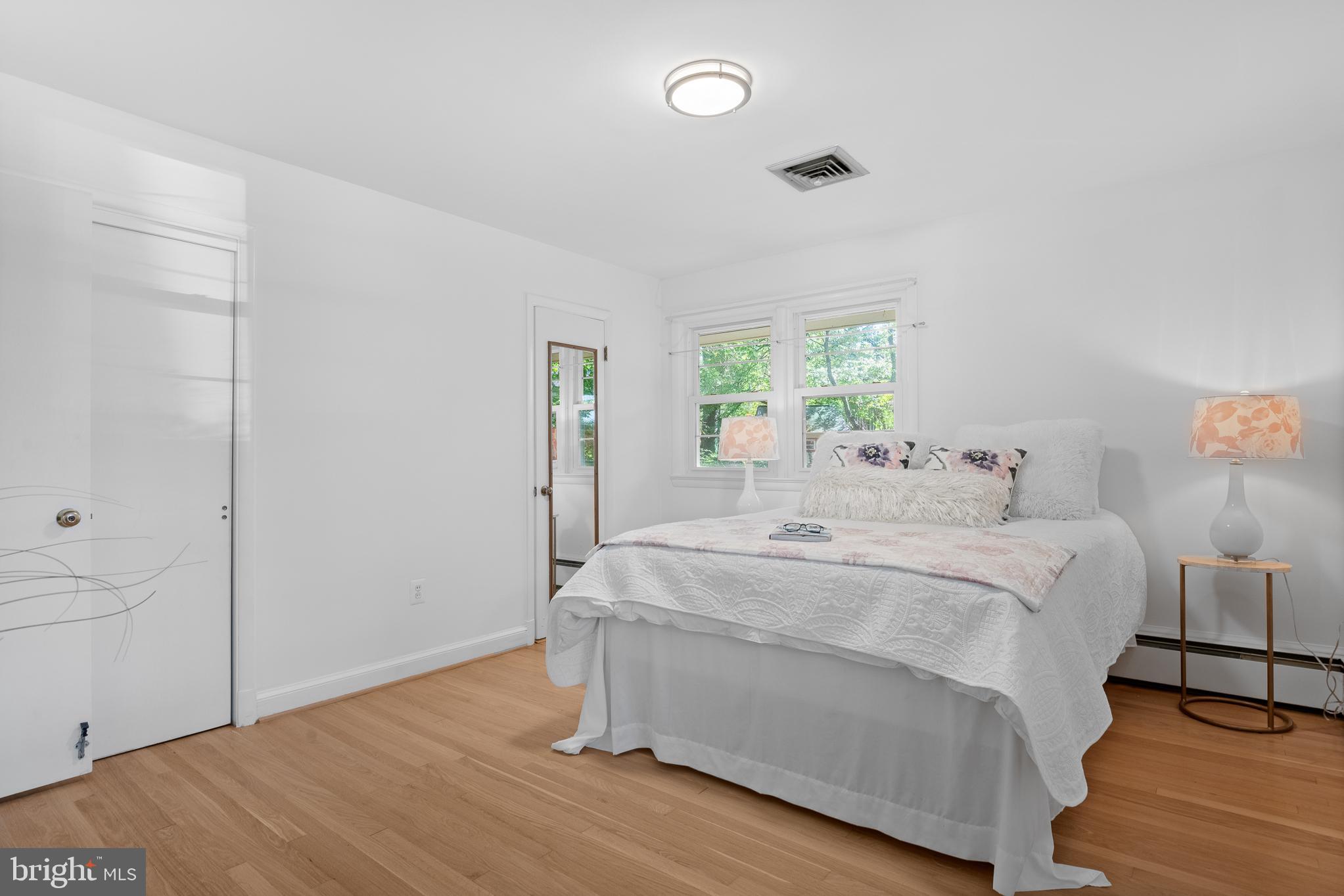 1006 Strout Street Silver Spring, MD 20901 - Photo 25 of 54 a bedroom with a bed and a window