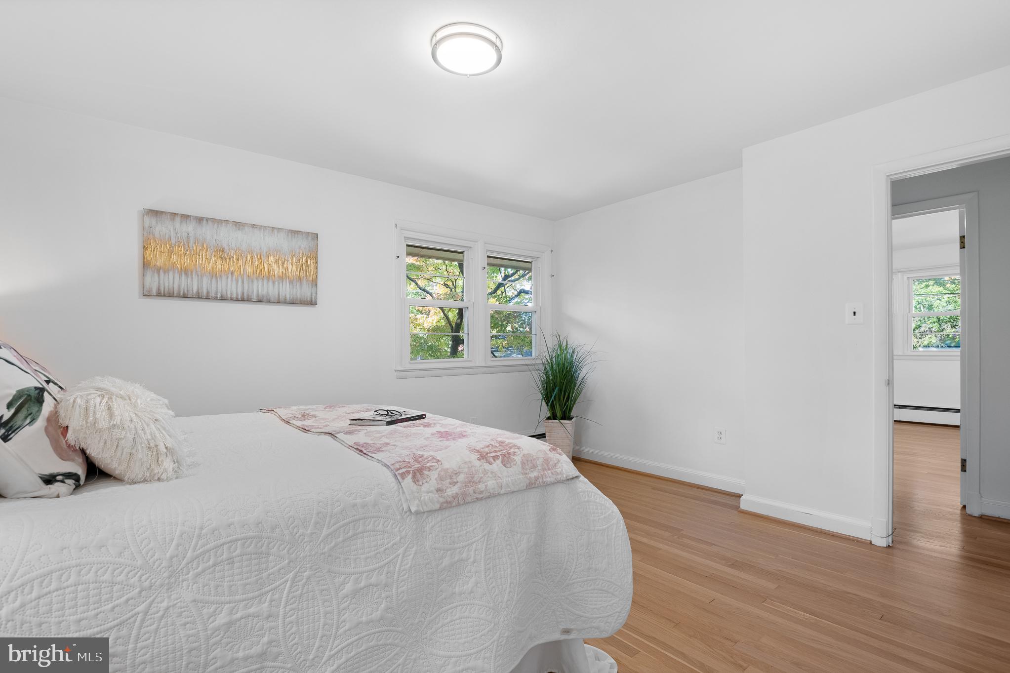 1006 Strout Street Silver Spring, MD 20901 - Photo 27 of 54 a bedroom with a bed and a window