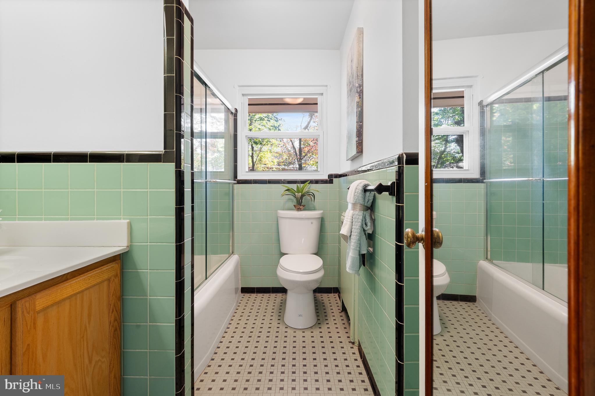 1006 Strout Street Silver Spring, MD 20901 - Photo 34 of 54 a bathroom with a toilet and a shower