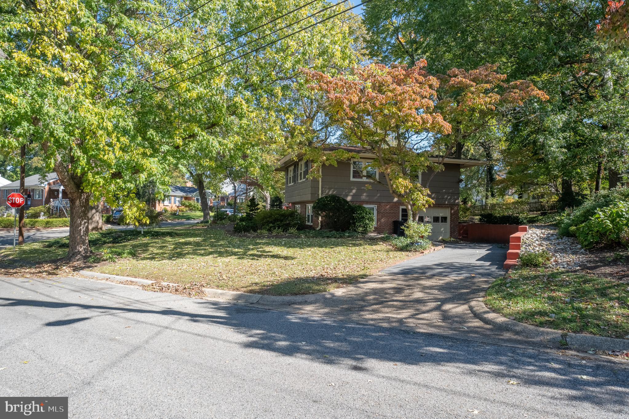 1006 Strout Street Silver Spring, MD 20901 - Photo 48 of 54 a view of a house with a yard and garage