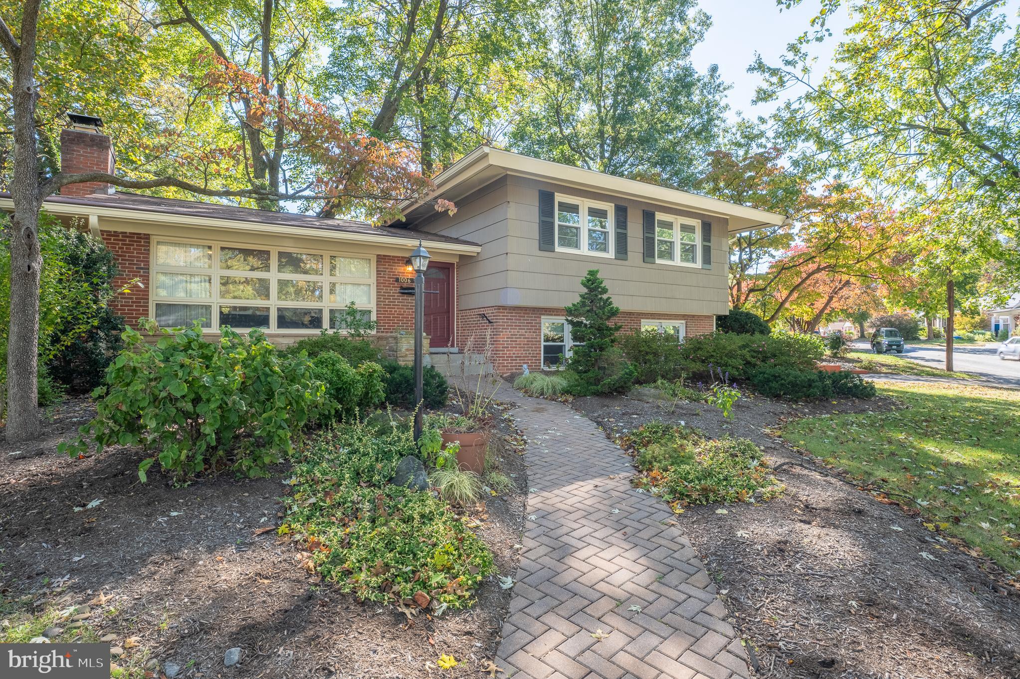 1006 Strout Street Silver Spring, MD 20901 - Photo 5 of 54 a view of a house with yard and tree s