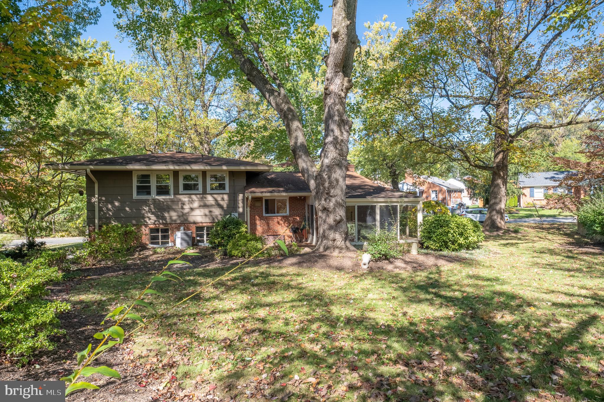1006 Strout Street Silver Spring, MD 20901 - Photo 51 of 54 a front view of a house with a garden