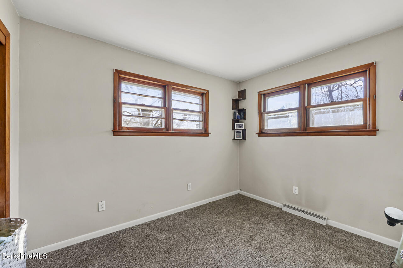 31 New Windsor Road Hinsdale, MA 01235 - Photo 11 of 15 an empty room with a window