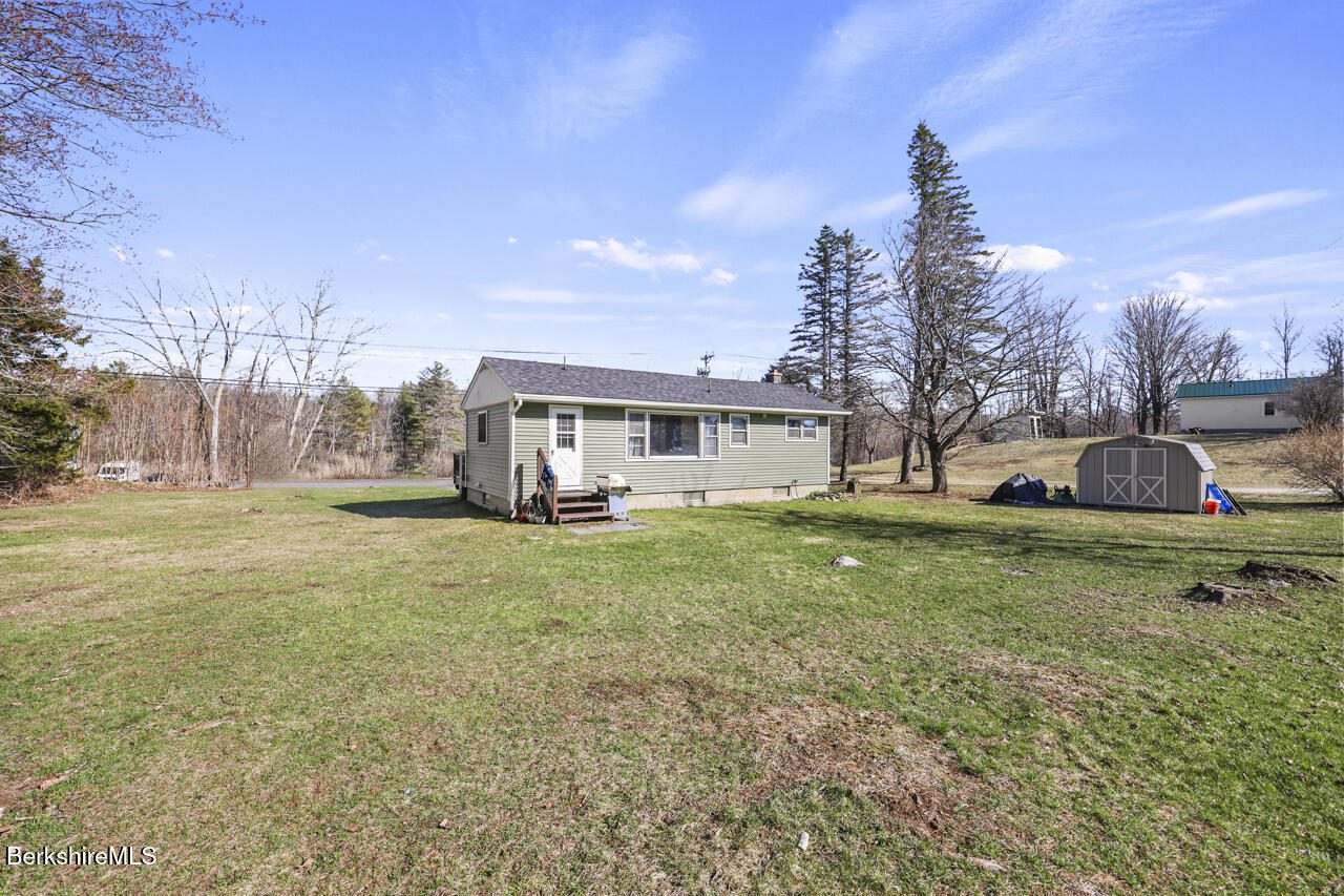 31 New Windsor Road Hinsdale, MA 01235 - Photo 14 of 15 a view of a house with backyard and garden