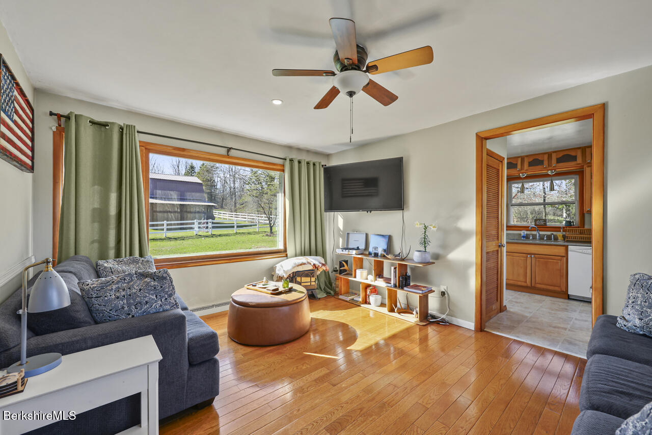 31 New Windsor Road Hinsdale, MA 01235 - Photo 3 of 15 a living room with furniture and a large window