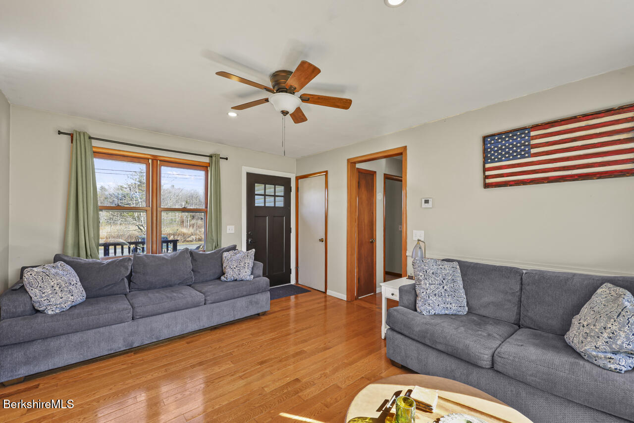 31 New Windsor Road Hinsdale, MA 01235 - Photo 5 of 15 a living room with furniture and a large window