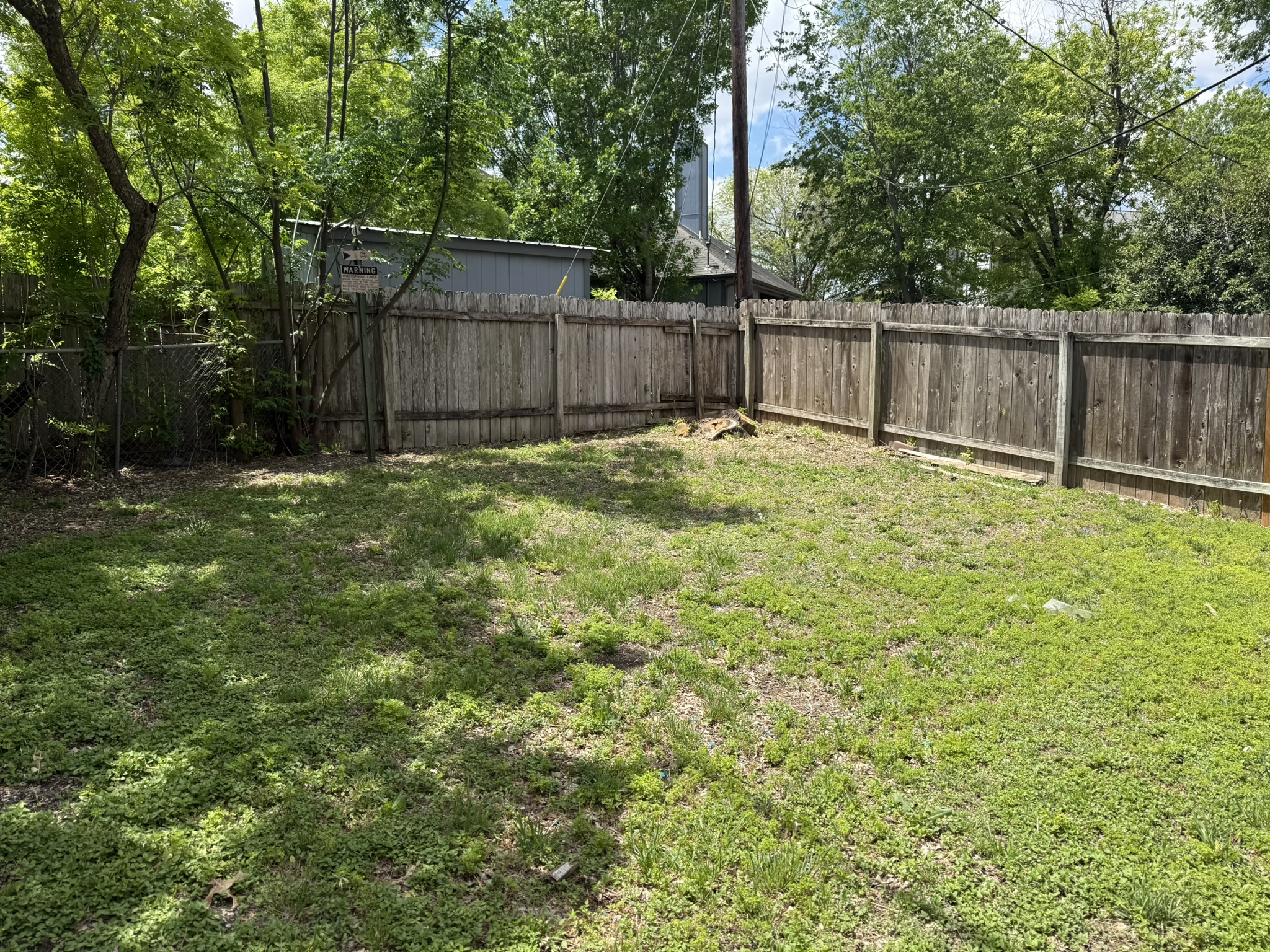 1209 Armadillo Road, Unit A Austin, TX 78745 - Photo 13 of 15 View of fenced backyard