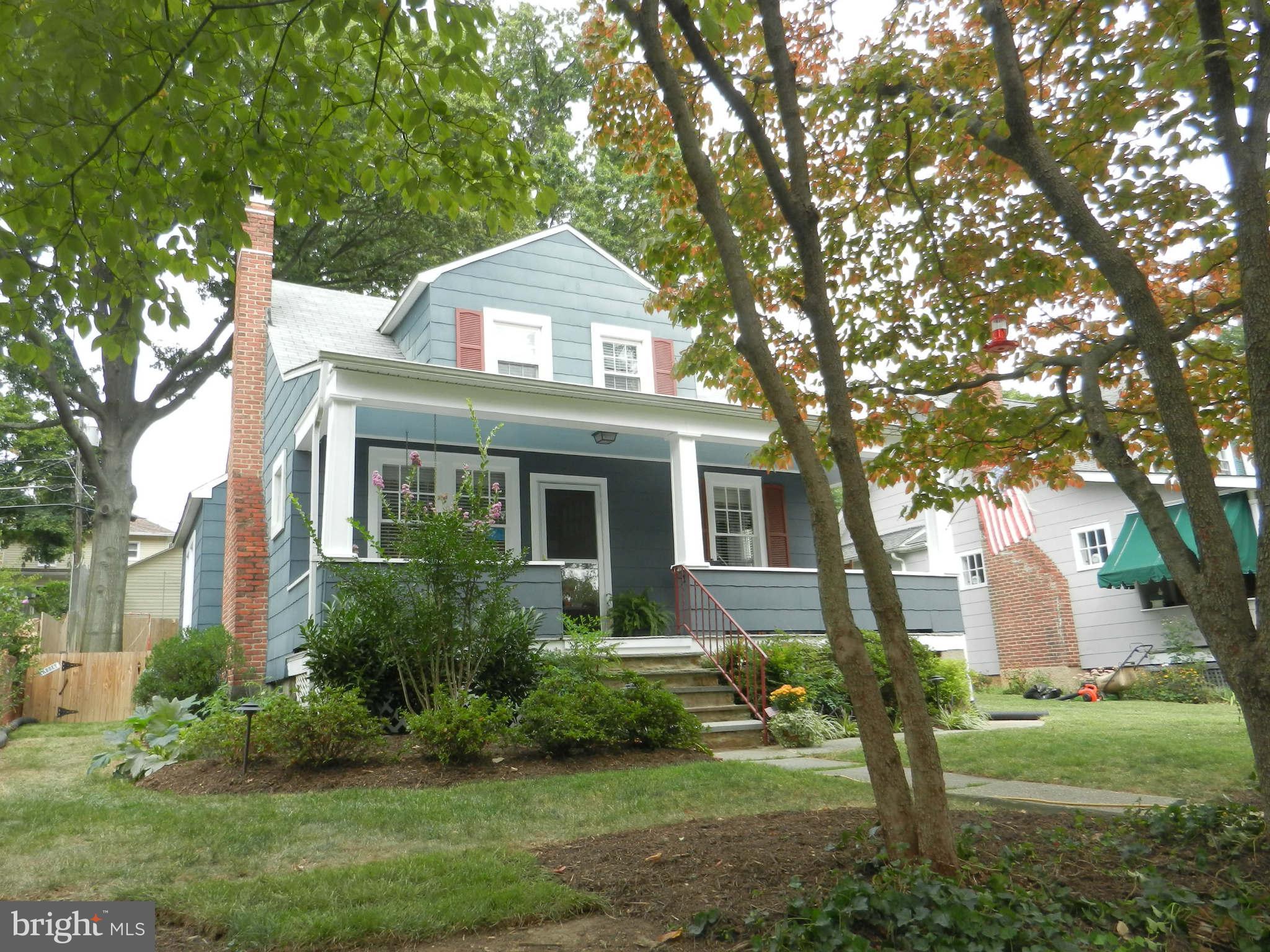 704 Murdock Road Baltimore, MD 21212 - Photo 1 of 1 a front view of a house with a yard and garage