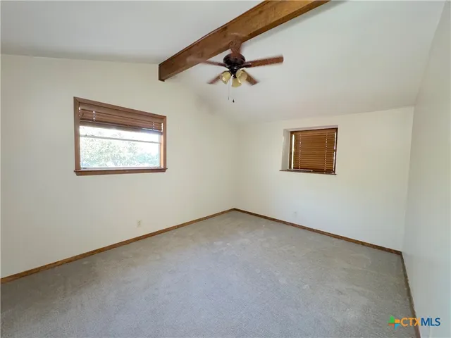 an empty room with a window