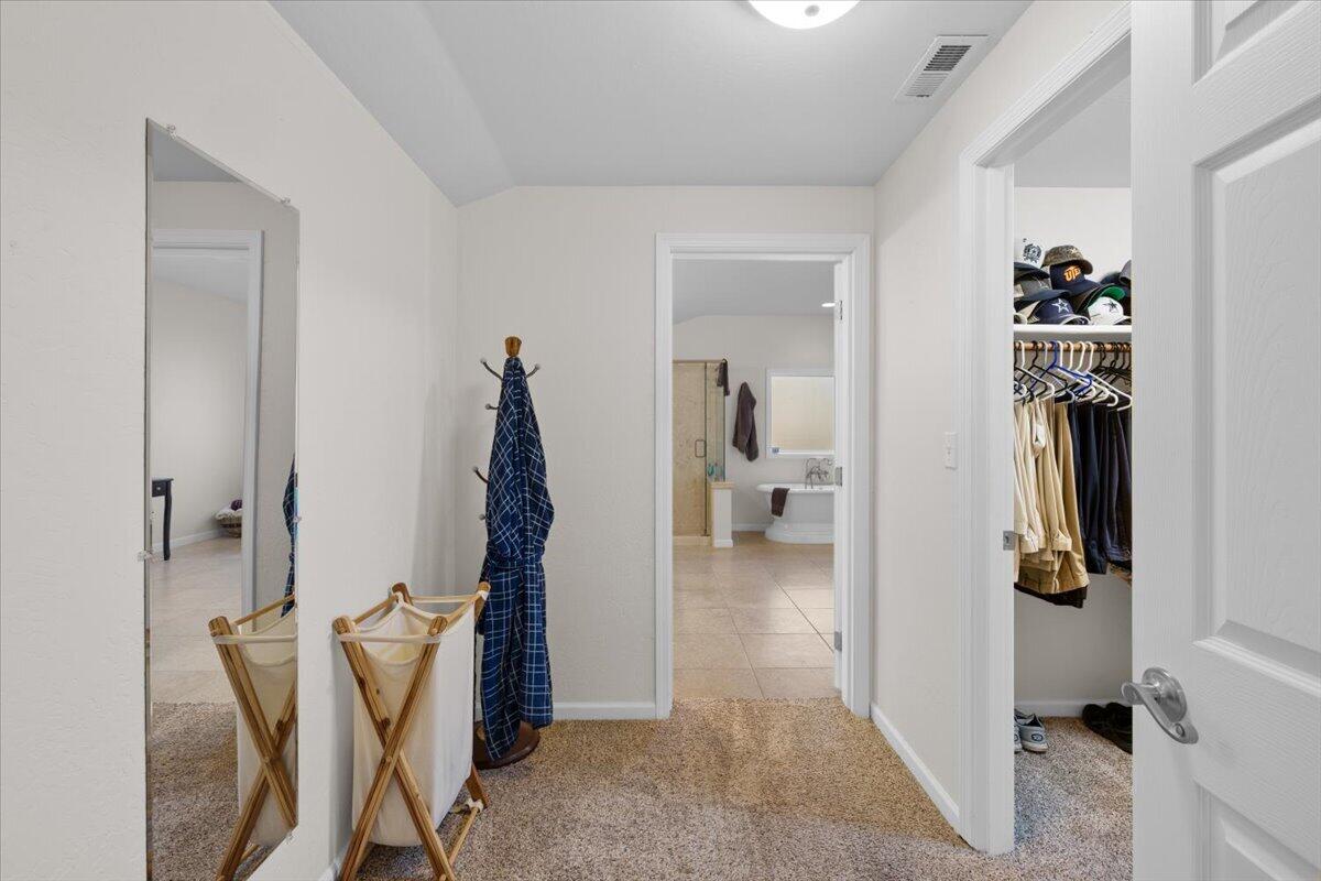 324 China Gulch Road Jacksonville, OR 97530 - Photo 22 of 45 a view of a room with lots of furniture and closet