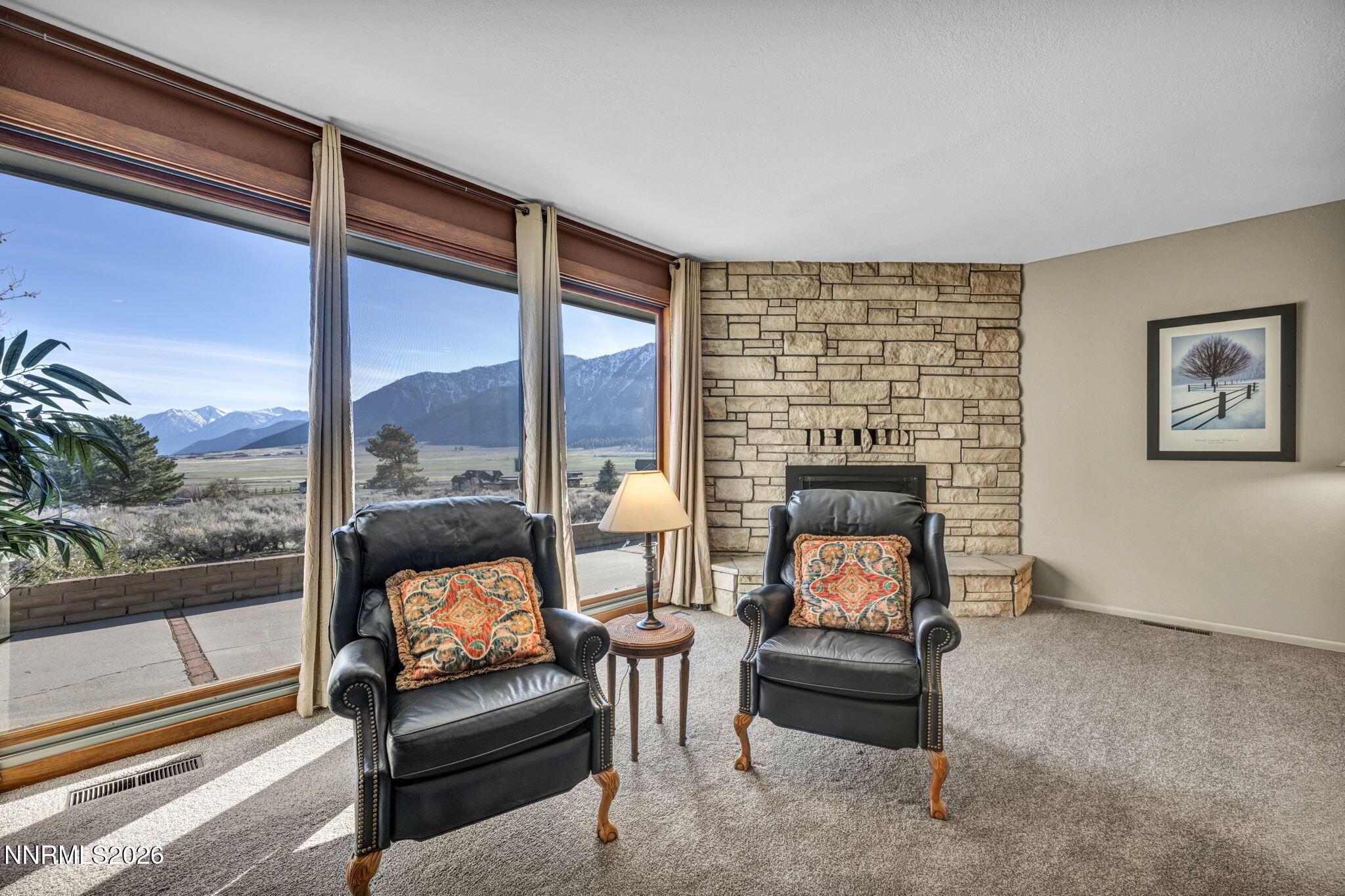 3464 Alpine View Court Carson City, NV 89705 - Photo 12 of 97 a living room with furniture and a fireplace
