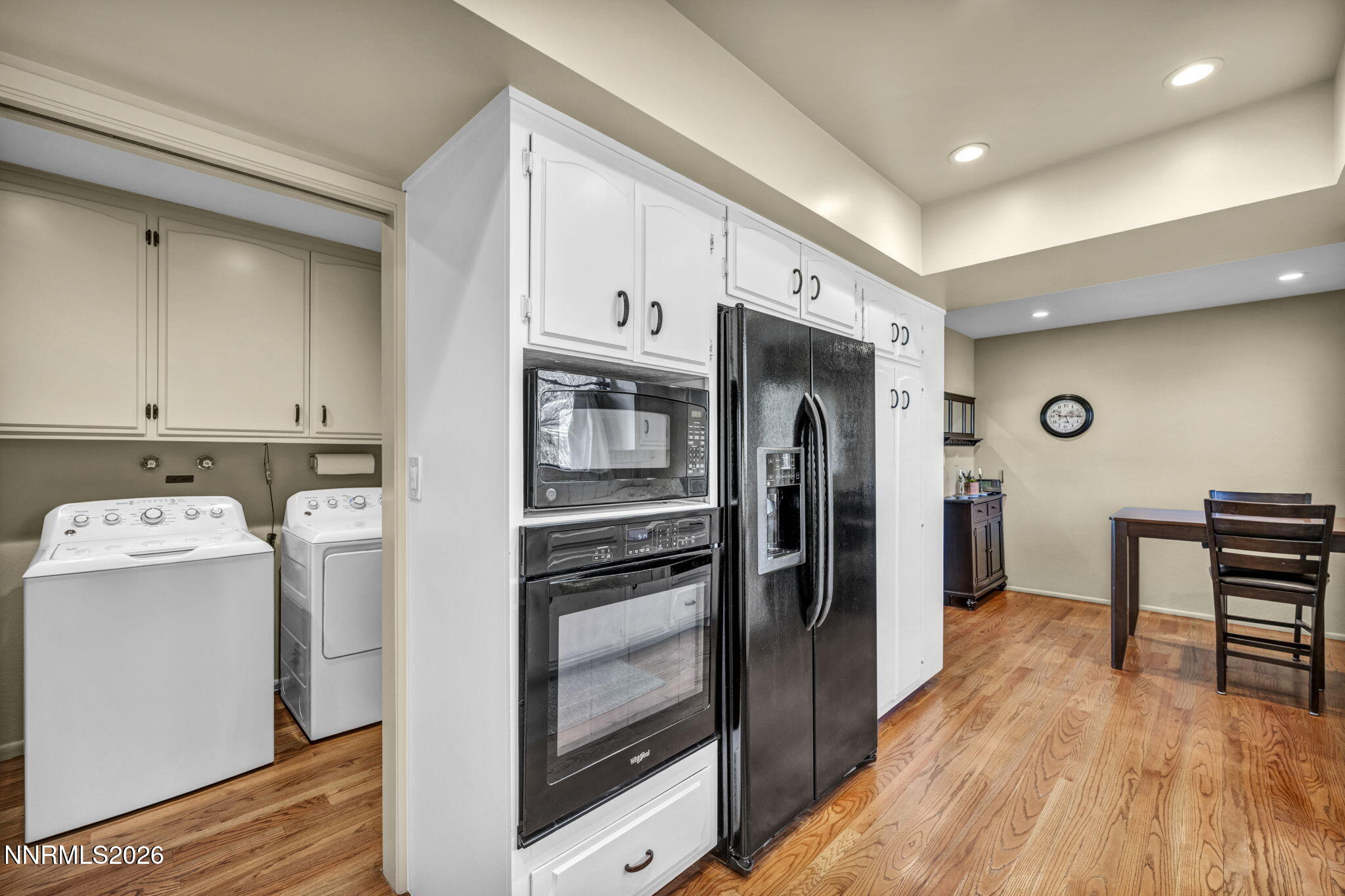 3464 Alpine View Court Carson City, NV 89705 - Photo 26 of 97 a view of a kitchen with refrigerator and wooden floor