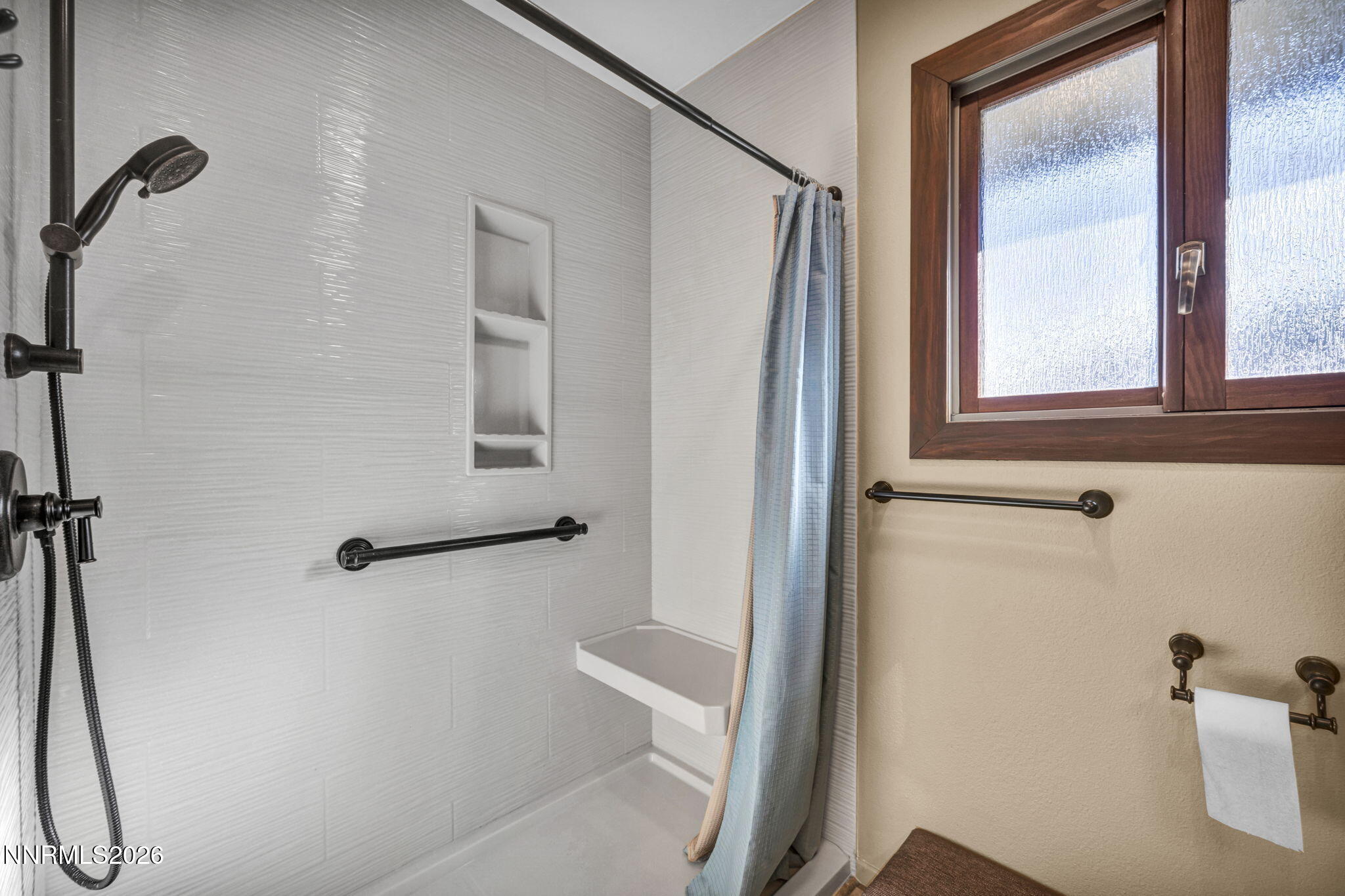 3464 Alpine View Court Carson City, NV 89705 - Photo 37 of 97 a bathroom with a bathtub and a shower