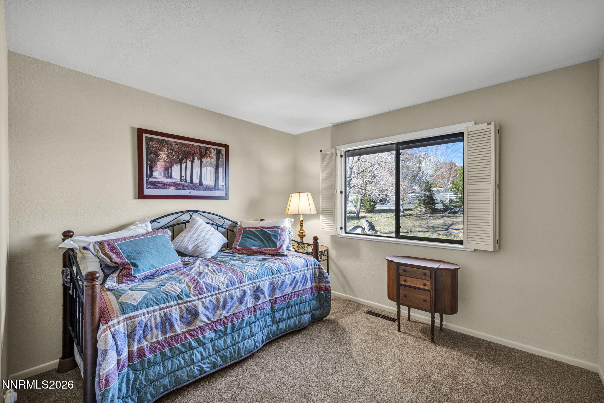 3464 Alpine View Court Carson City, NV 89705 - Photo 40 of 97 a bedroom with a bed and a window