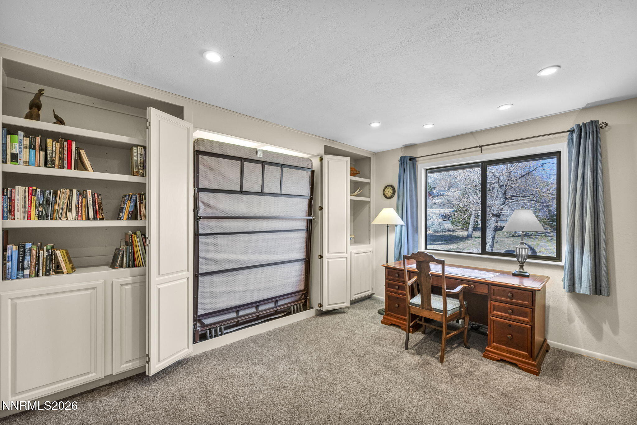 3464 Alpine View Court Carson City, NV 89705 - Photo 43 of 97 a living room with furniture and a flat screen tv