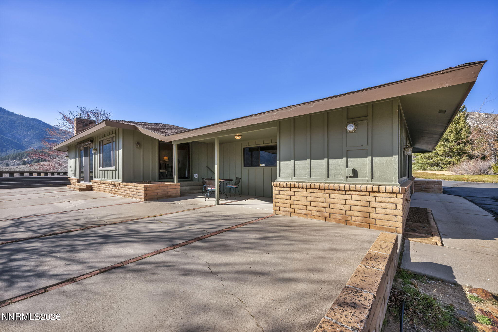 3464 Alpine View Court Carson City, NV 89705 - Photo 75 of 97 a front view of a house with a yard and garage