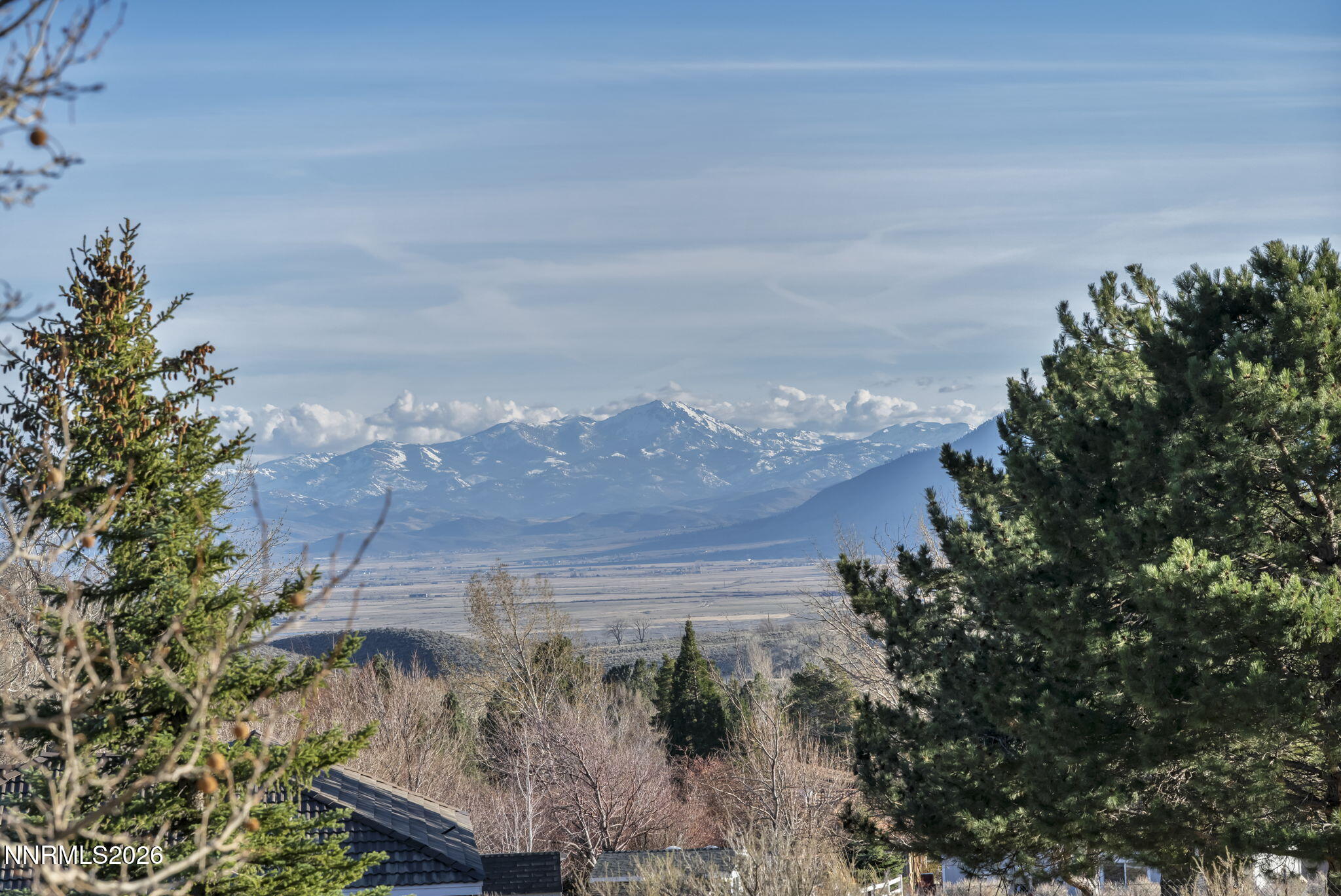 3464 Alpine View Court Carson City, NV 89705 - Photo 89 of 97 a view of a lake with a mountain in the background
