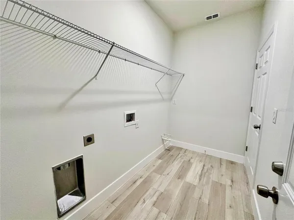 a view of a room with an empty space