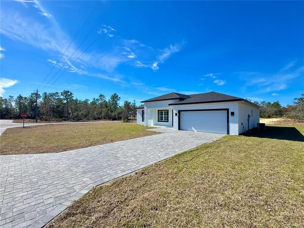 a house view with a outdoor space