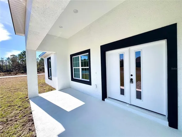 a view of a living room with furniture