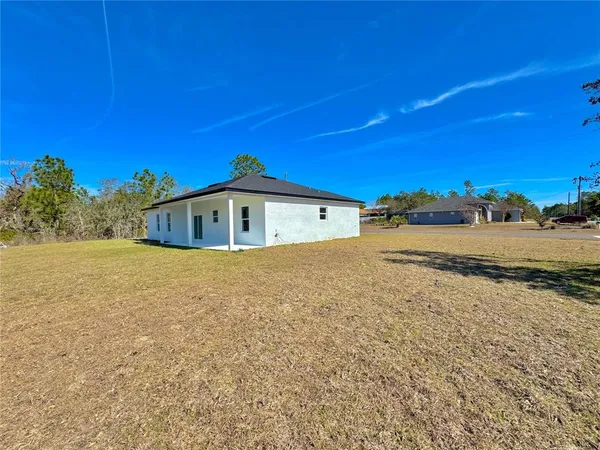 a front view of house with yard