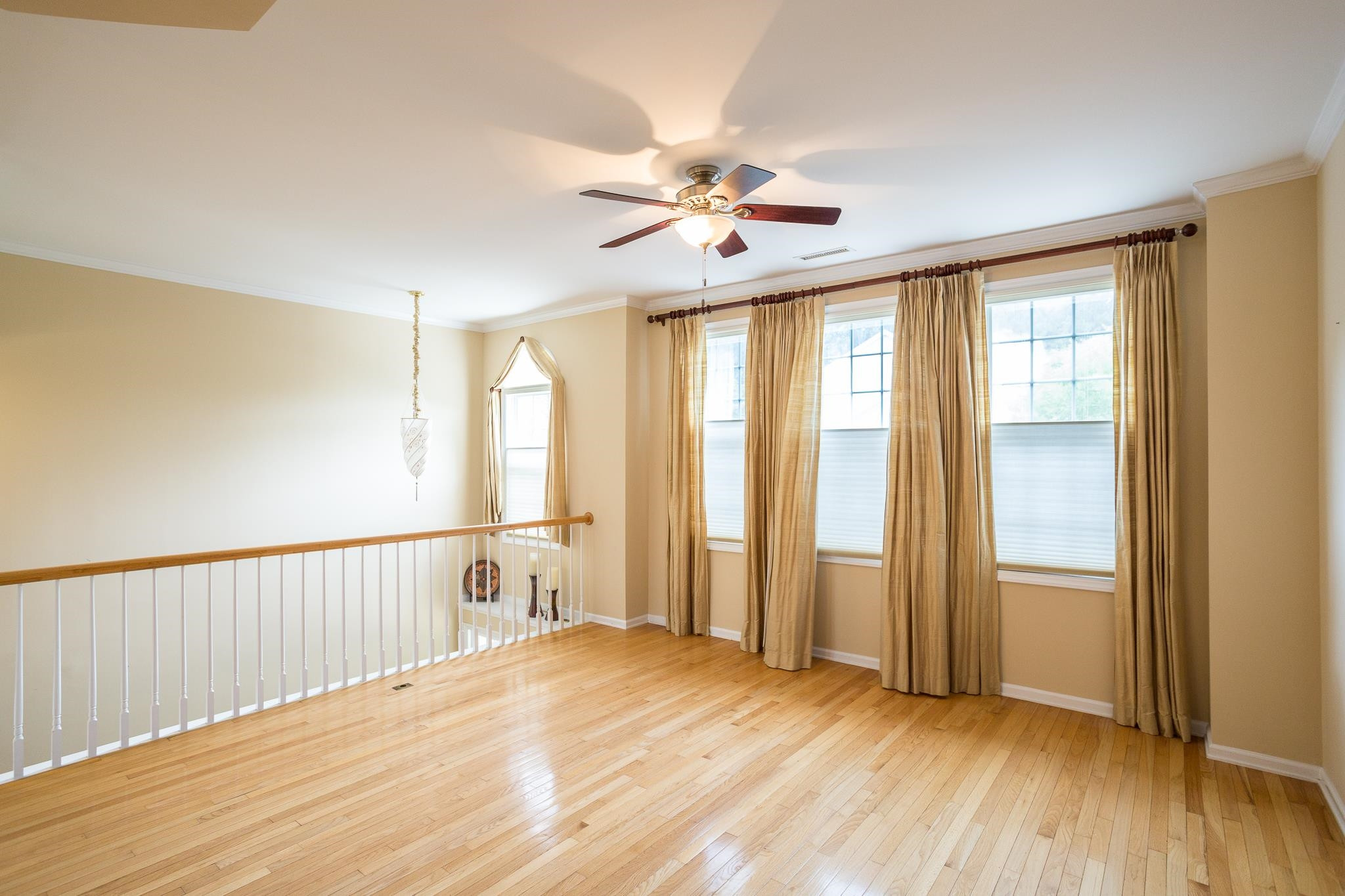 6905 Middleboro Drive Raleigh, NC 27612 - Photo 4 of 23 From the vaulted ceiling in the foyer to the bright and airy wall of windows, it's easy to take a breath and relax in this living room. Living Room