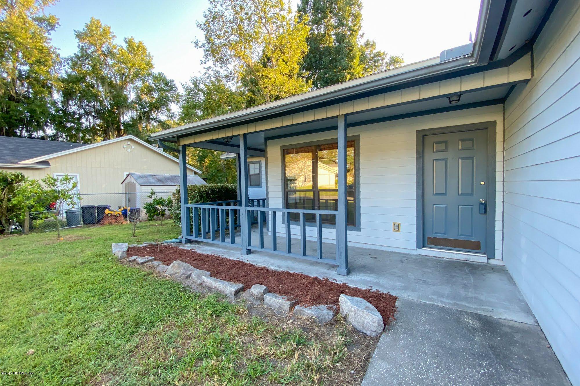 2148 Rothbury Drive Jacksonville, FL 32221 - Photo 2 of 36 a view of a house with backyard and porch