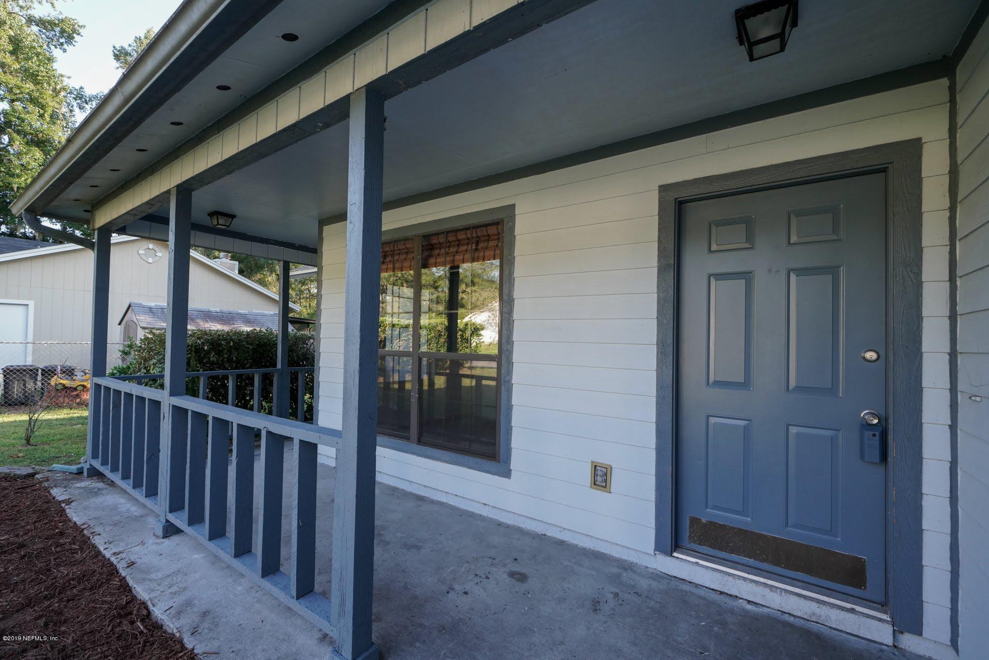 2148 Rothbury Drive Jacksonville, FL 32221 - Photo 3 of 36 a view of a porch with a door
