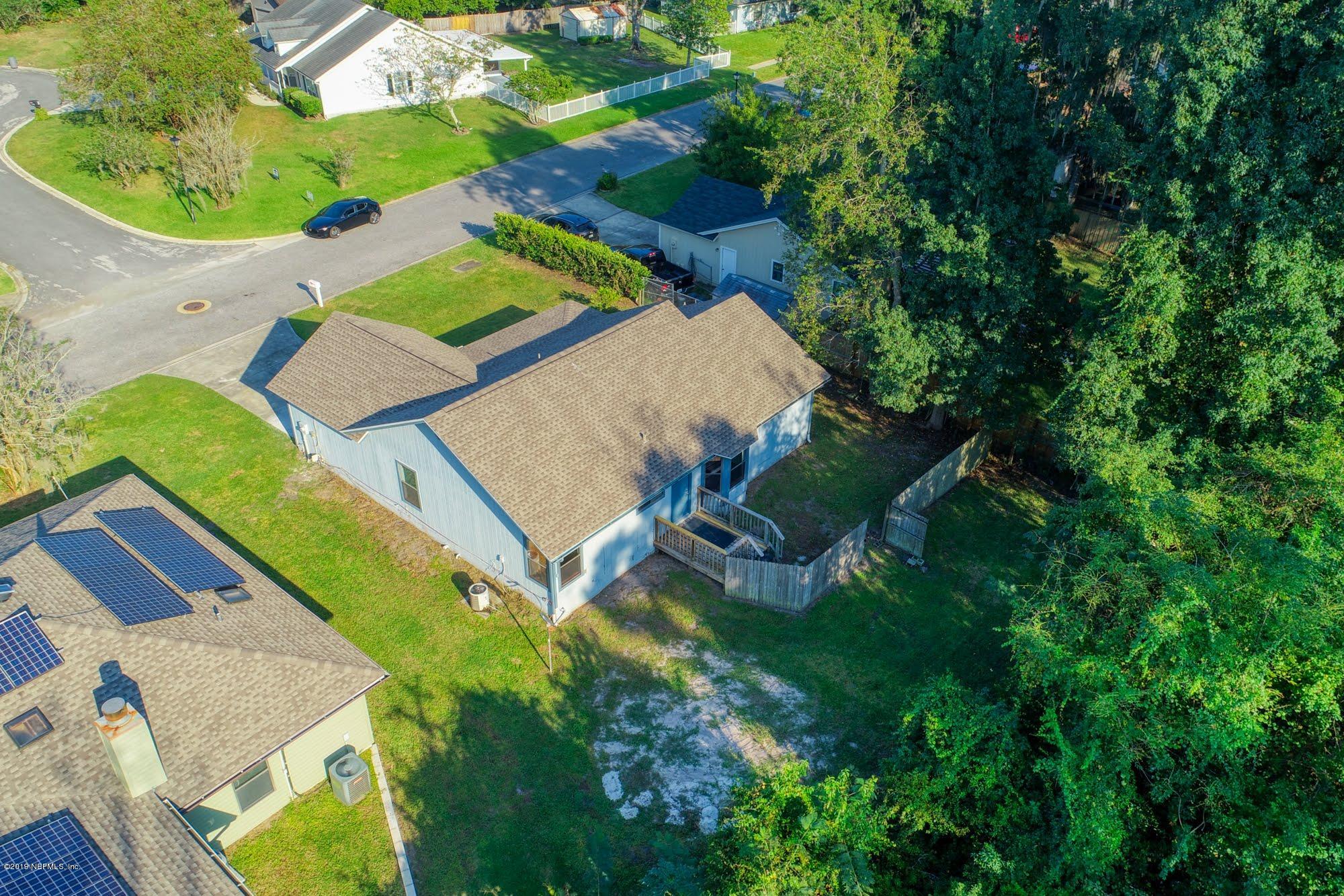 2148 Rothbury Drive Jacksonville, FL 32221 - Photo 32 of 36 an aerial view of a house with a yard basket ball court and outdoor seating
