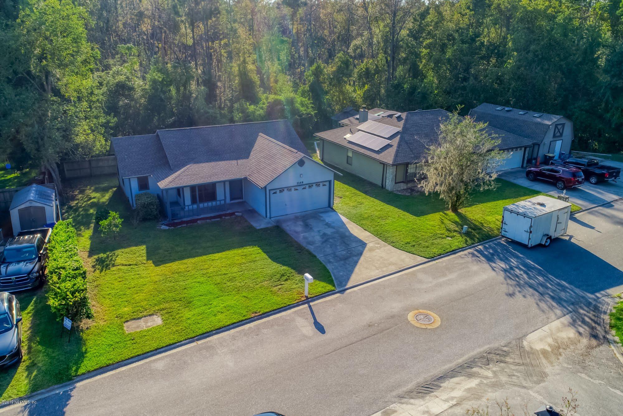 2148 Rothbury Drive Jacksonville, FL 32221 - Photo 33 of 36 an aerial view of a house with garden