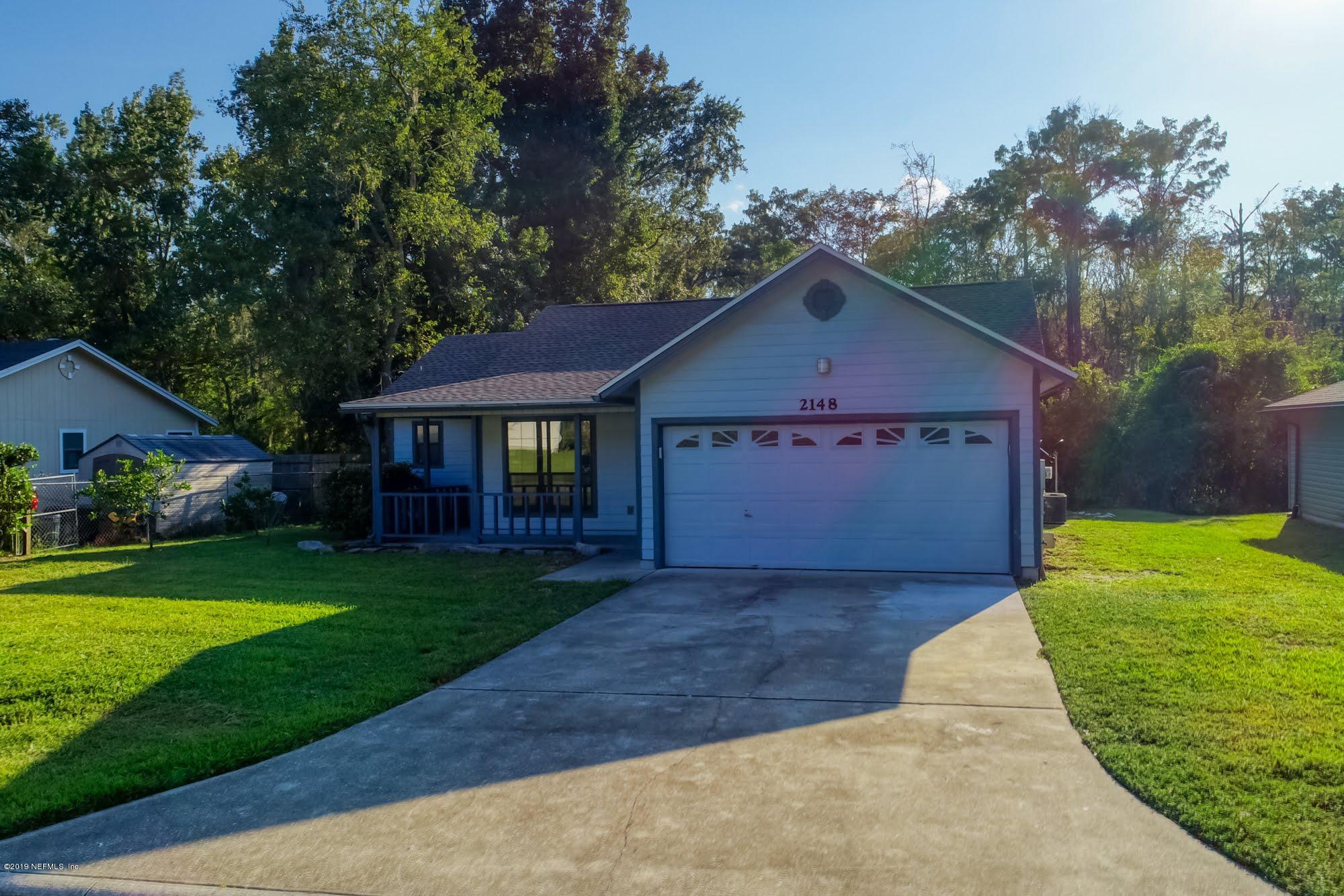 2148 Rothbury Drive Jacksonville, FL 32221 - Photo 35 of 36 a view of a house with garden