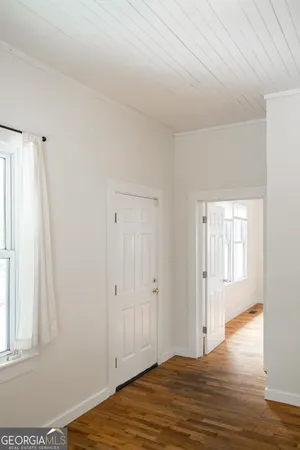 a view of a room that has a window in it