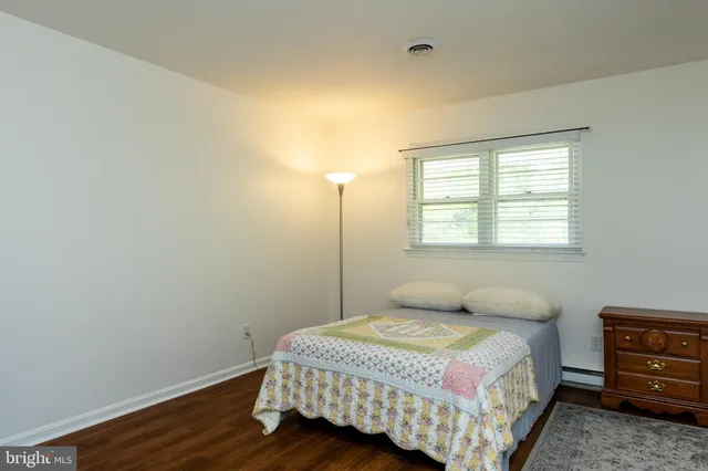 a view of a house with a yard and garage