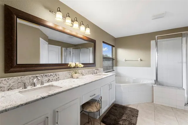 $564,400 | 4553 Pointe O Woods Drive, Wesley Chapel, FL 33543