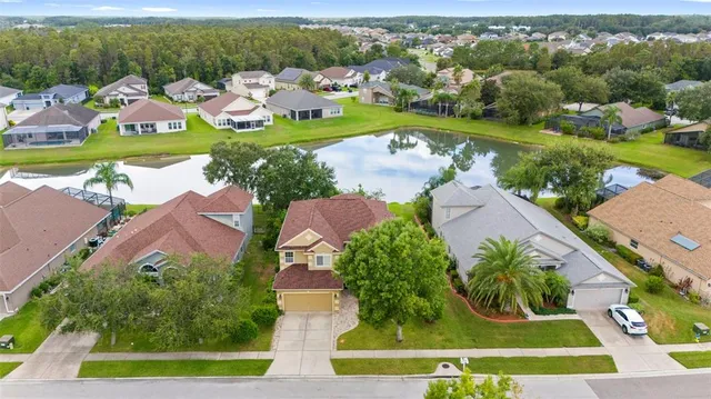 $564,400 | 4553 Pointe O Woods Drive, Wesley Chapel, FL 33543