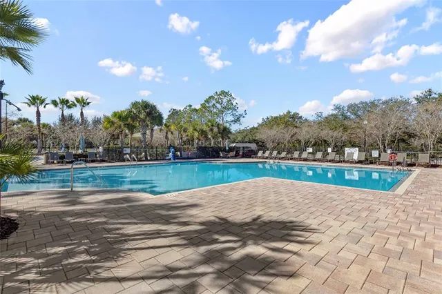 $564,400 | 4553 Pointe O Woods Drive, Wesley Chapel, FL 33543