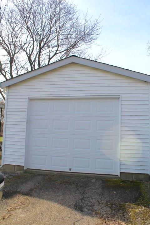 163 Hall Road Aliquippa, PA 15001 - Photo 16 of 16 1 Car Detached garage which is oversized. Garage has a man door to exit and then right into the side porch of the home.