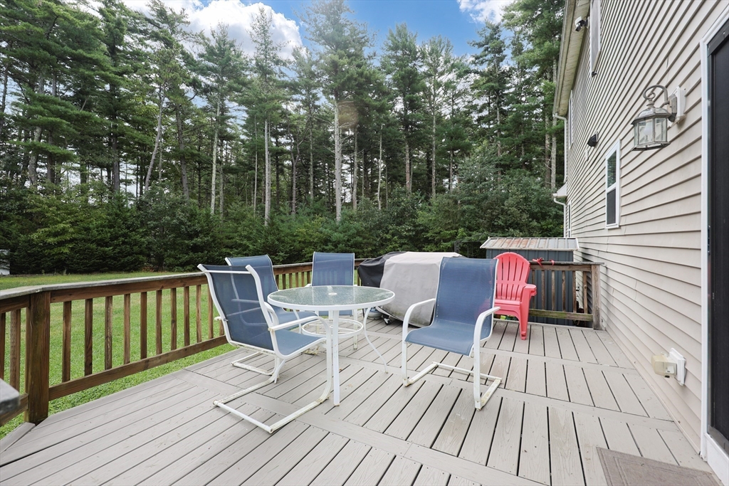 48 Wareham Street Carver, MA 02330 - Photo 12 of 42 a view of a white chairs on the roof deck