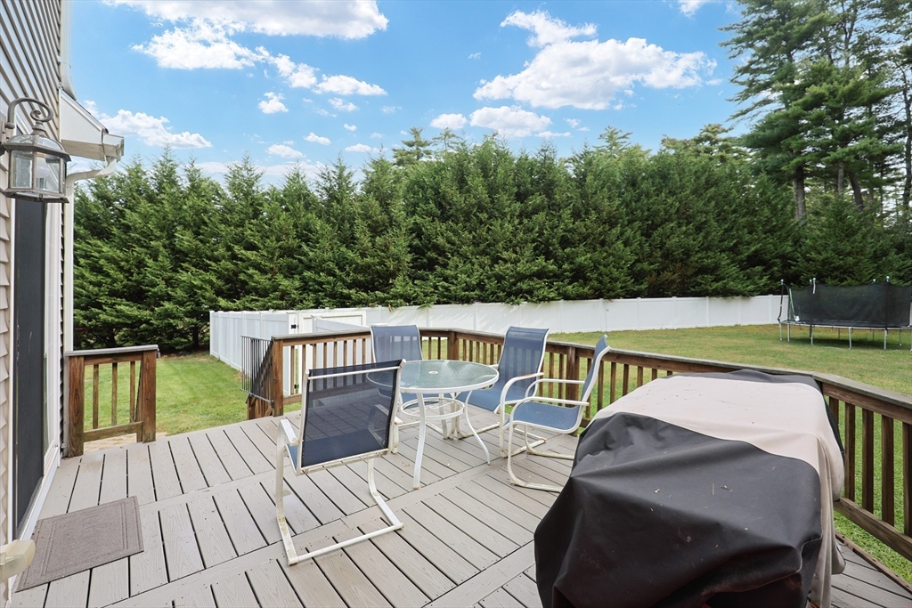 48 Wareham Street Carver, MA 02330 - Photo 13 of 42 a view of yard from deck having patio