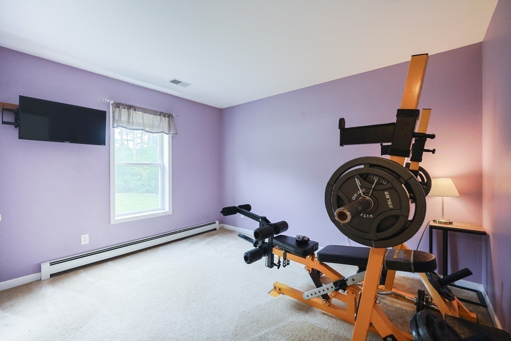 48 Wareham Street Carver, MA 02330 - Photo 27 of 42 a view of a room with gym equipment