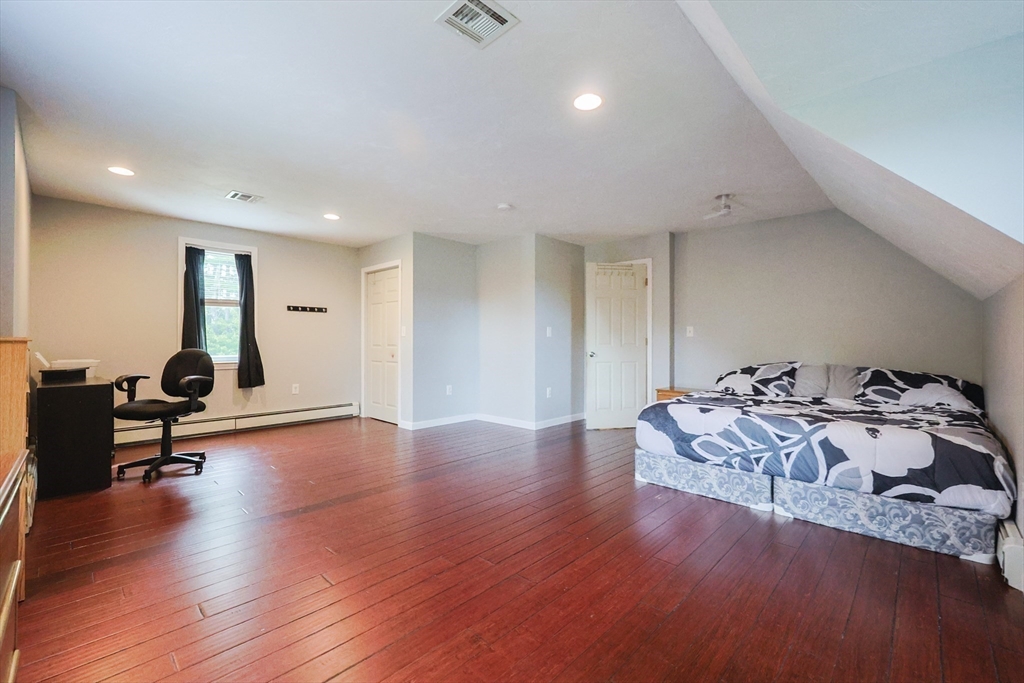 48 Wareham Street Carver, MA 02330 - Photo 30 of 42 a living room with furniture and wooden floor