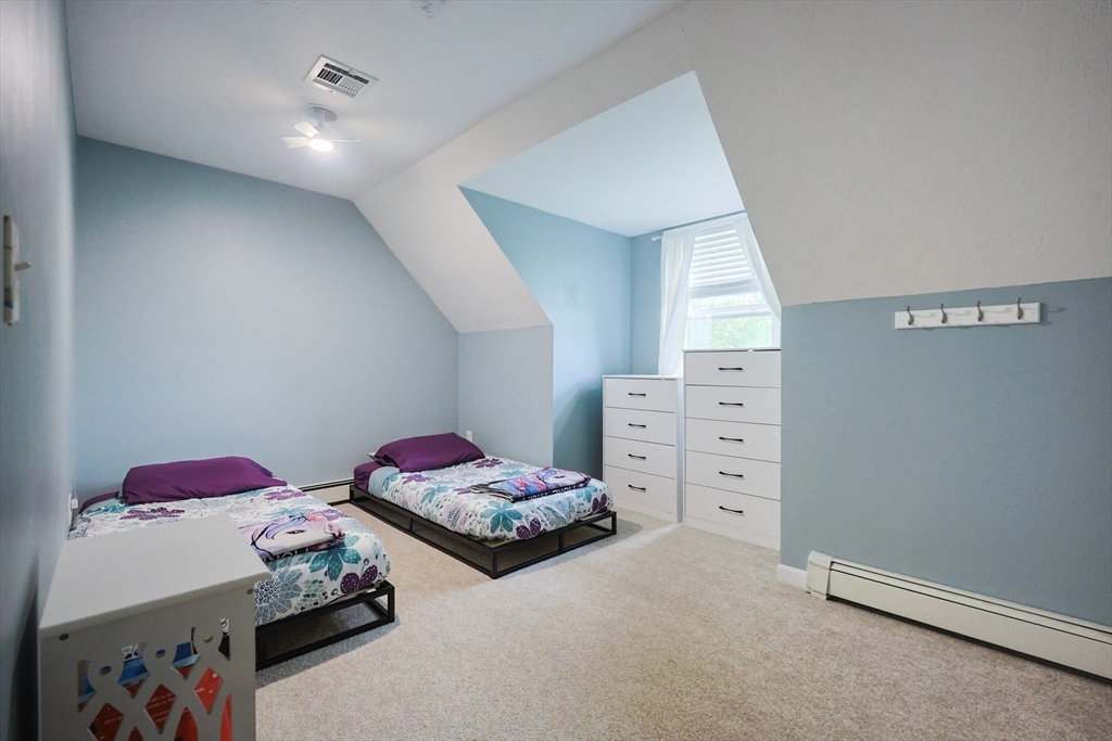 48 Wareham Street Carver, MA 02330 - Photo 34 of 42 a bedroom with furniture and a closet