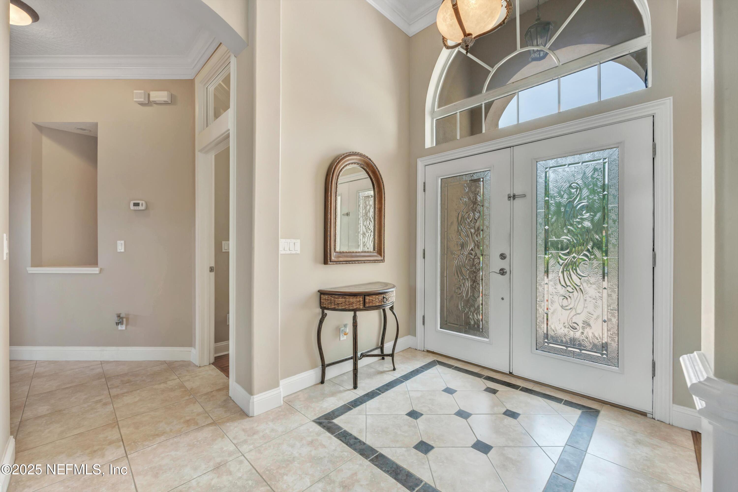 168 Pinehurst Pointe Drive St. Augustine, FL 32092 - Photo 14 of 72 a view of an entryway with a front door