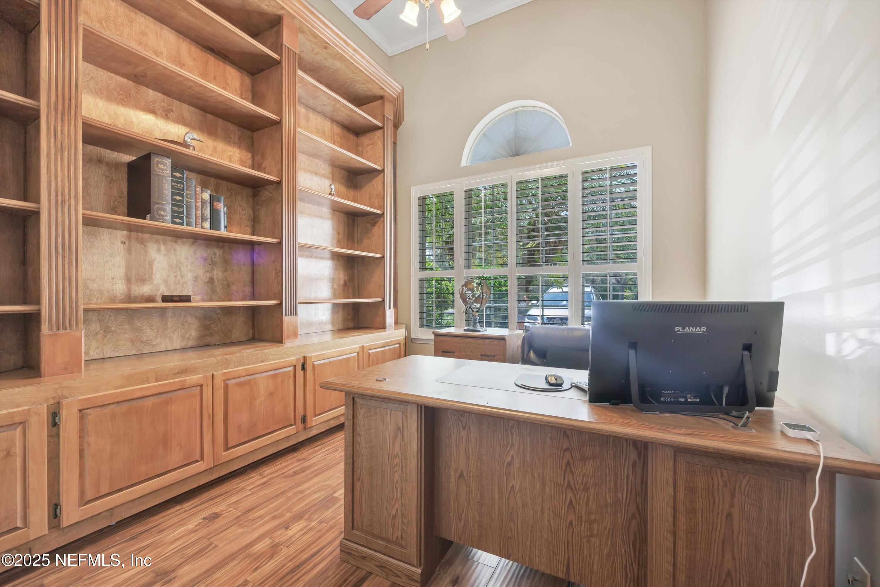 168 Pinehurst Pointe Drive St. Augustine, FL 32092 - Photo 46 of 72 a living room with a large window and furniture